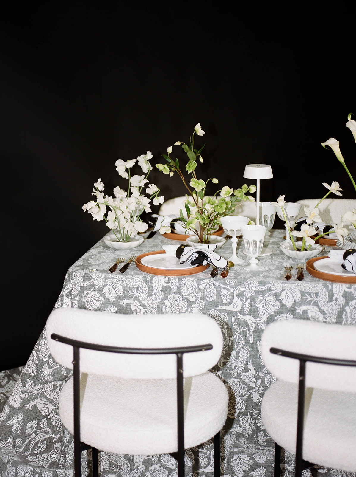 A small wedding table decorated with flowers