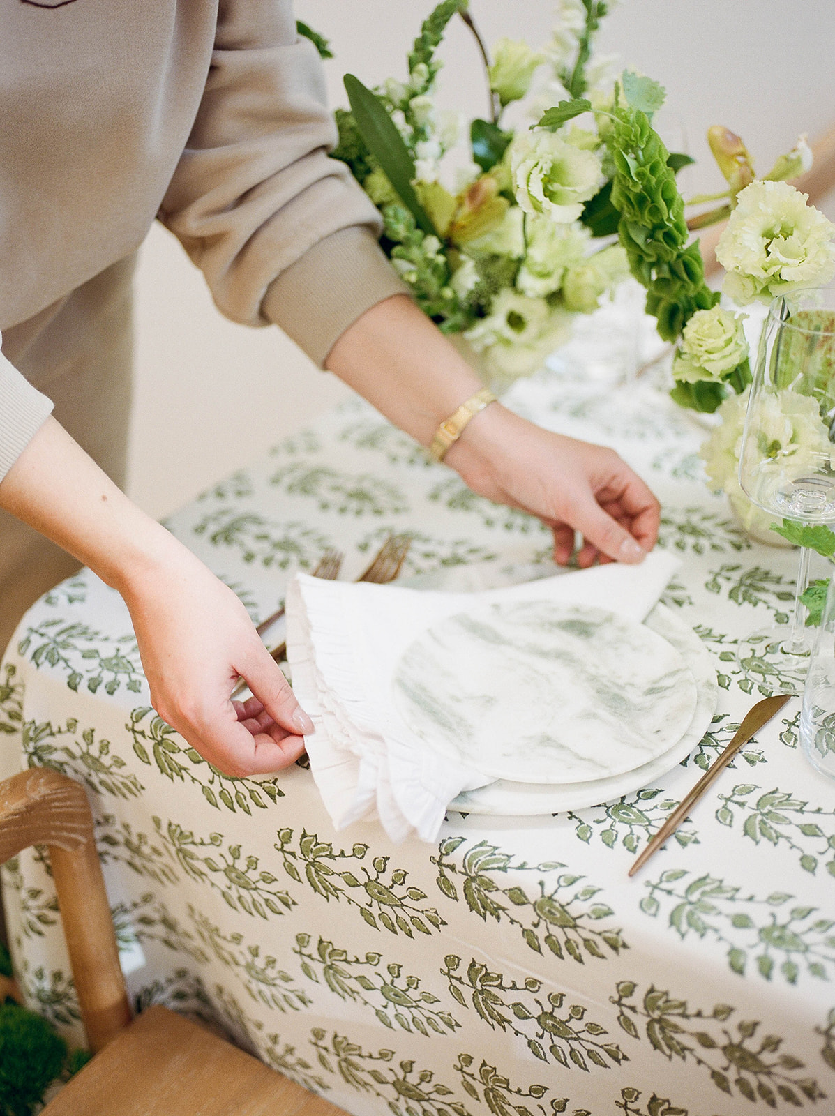 Linen napkins on a printed tablecloth for a wedding