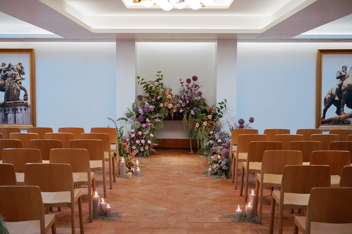A primarily purple floral arch in the Carina Ballroom at the Line DC