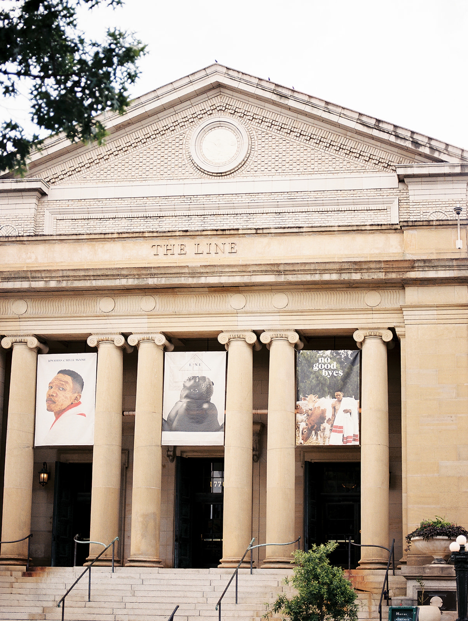 A film photograph of the columns in front of the Line Hotel, a hotel wedding venue in DC