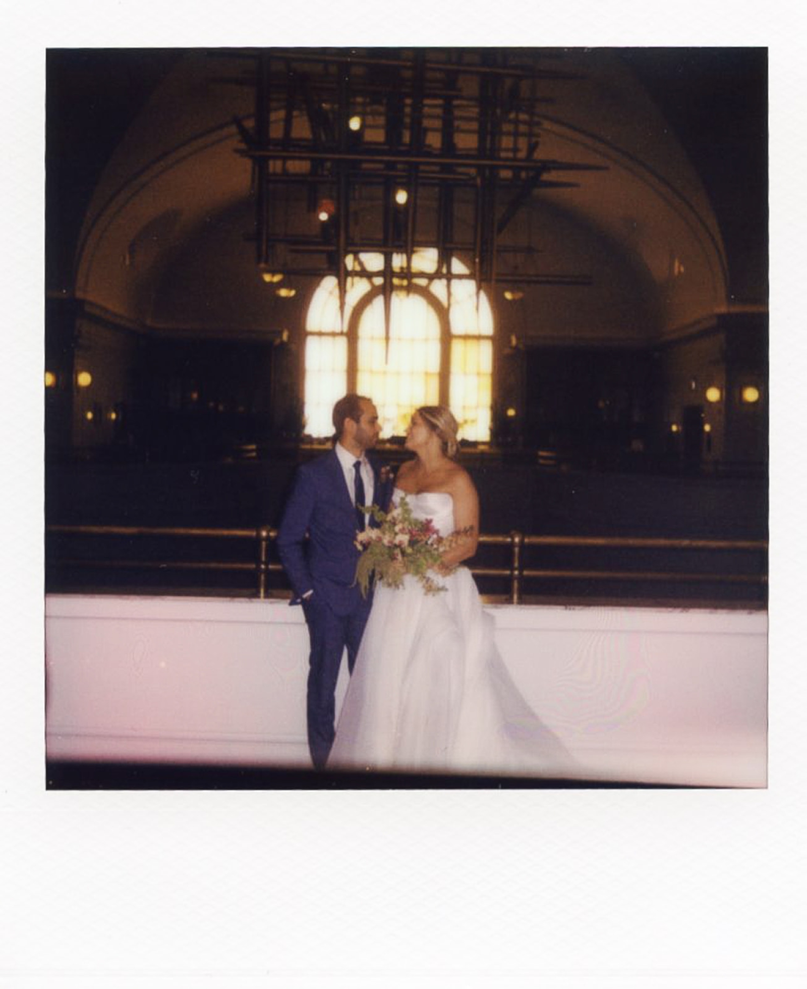 A Polaroid of a bride and groom in the Mezzanine of the Line Hotel in Washington DC