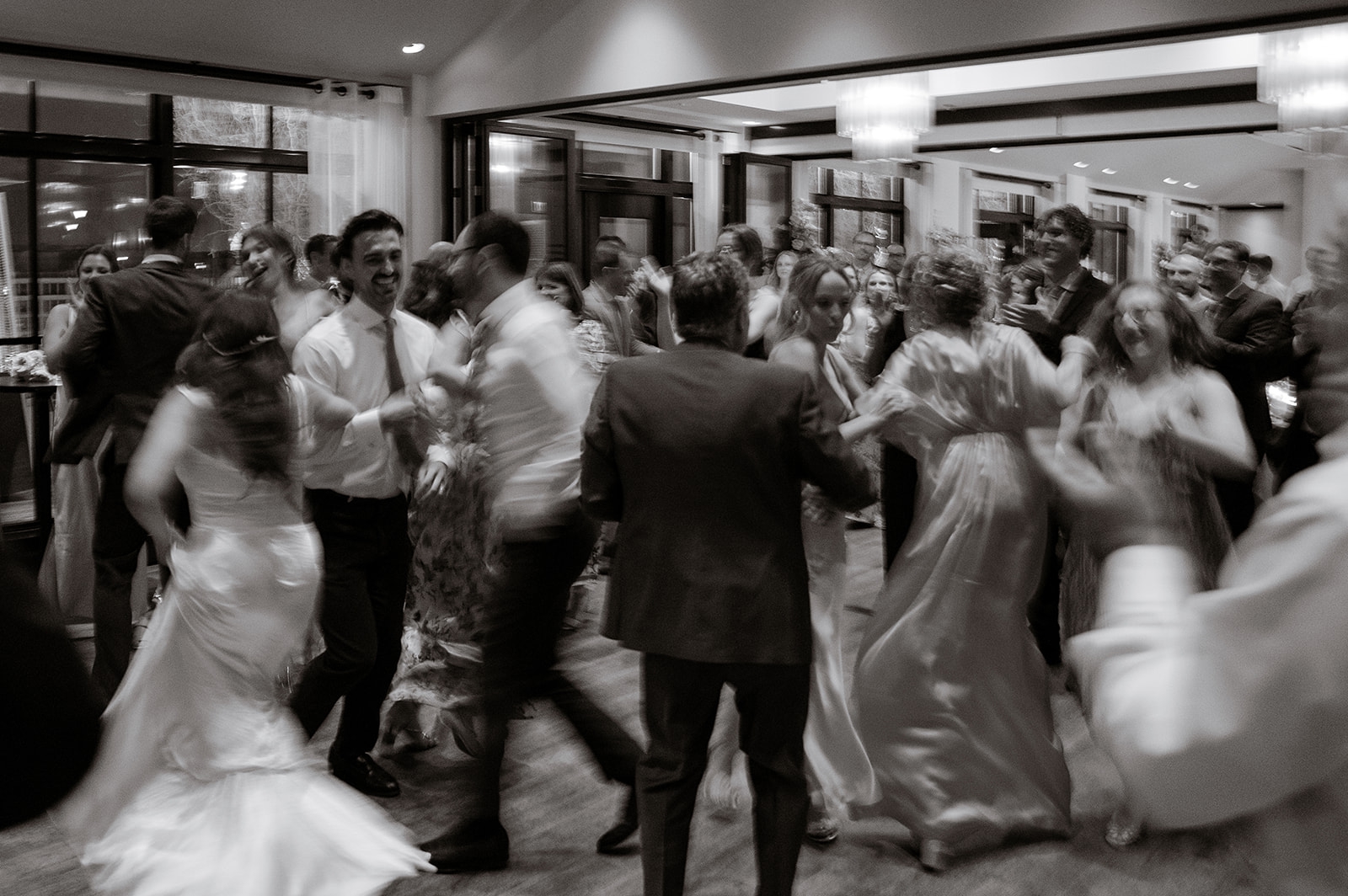 Guests dancing at a wedding reception at The Riggs Hotel 