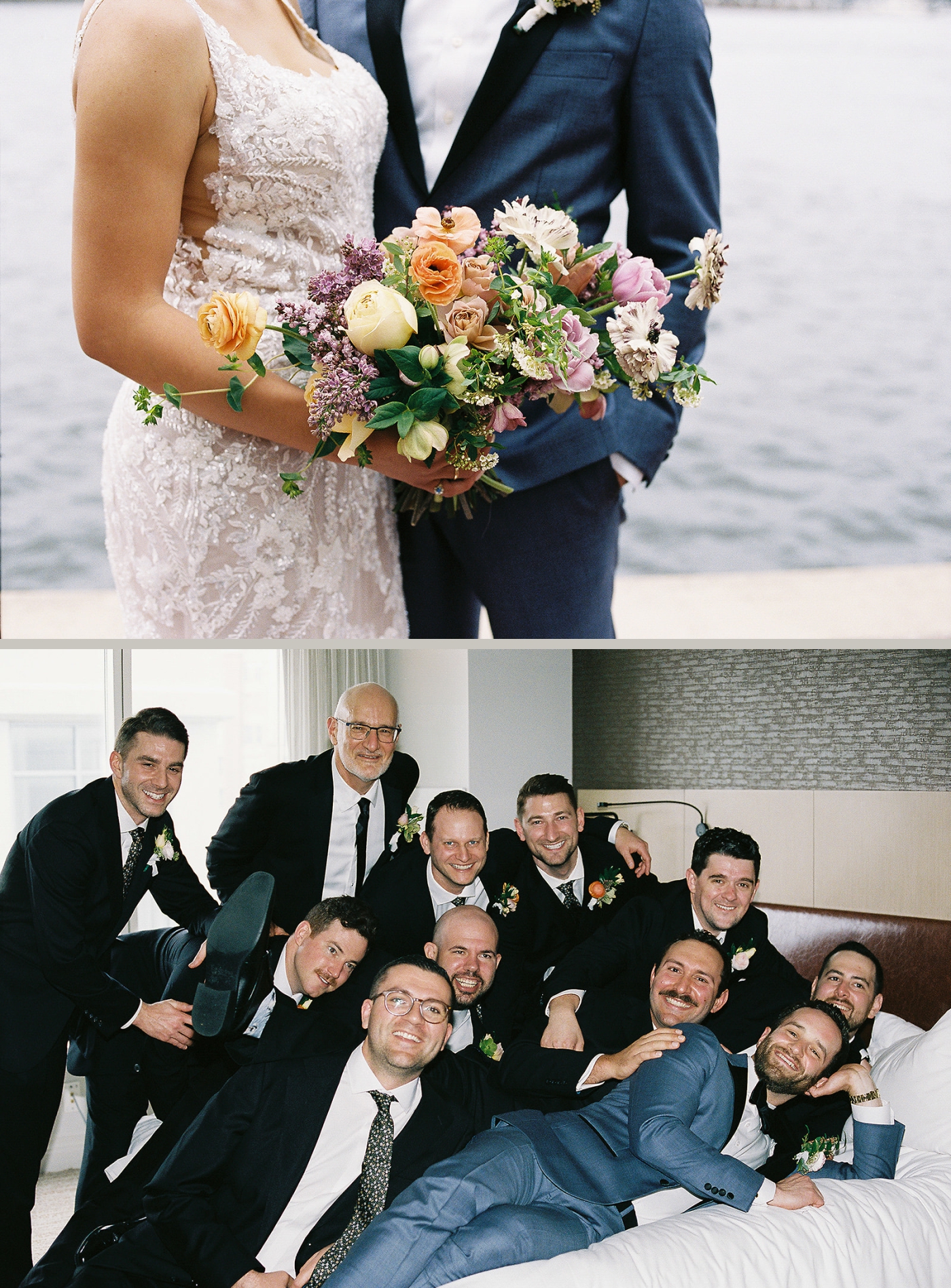 A groom in a blue suit and his groomsmen in black suits pile onto a hotel bed