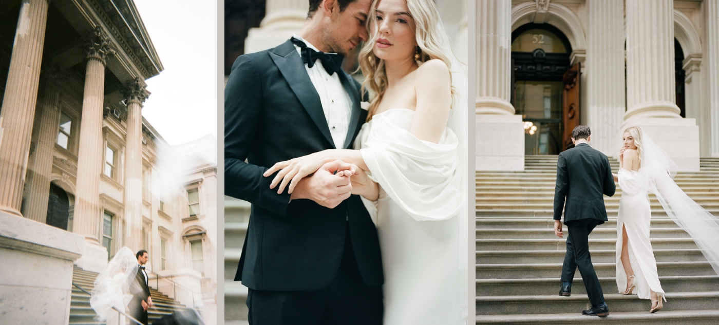 A bride and groom walk down the stairs of New York City Hall