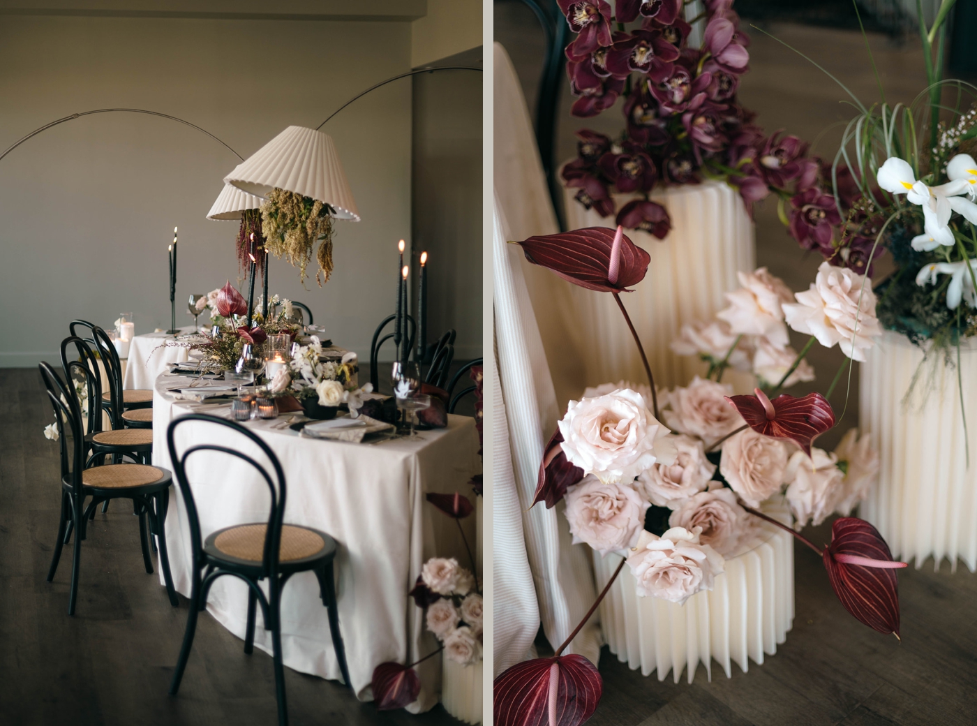 Details of a curved wedding reception table with rich red florals and pink roses