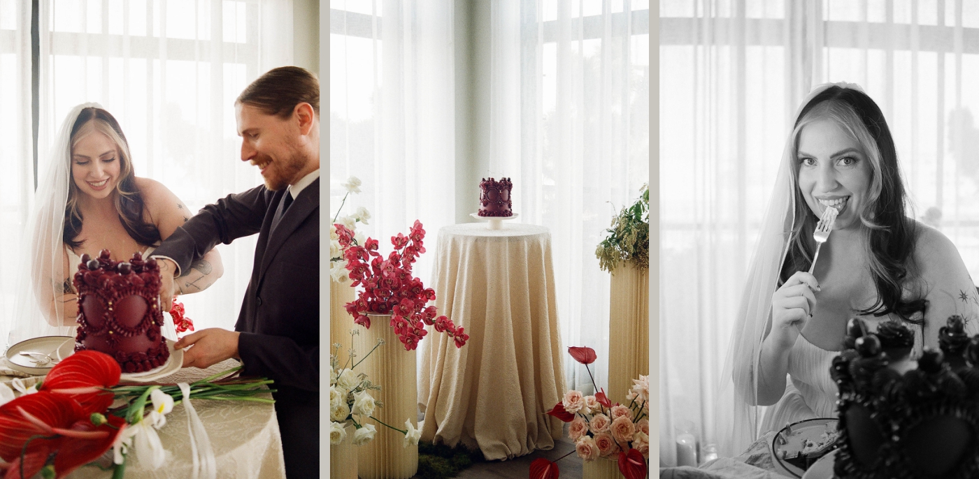 A burgundy vintage-style wedding cake cut by a bride and groom