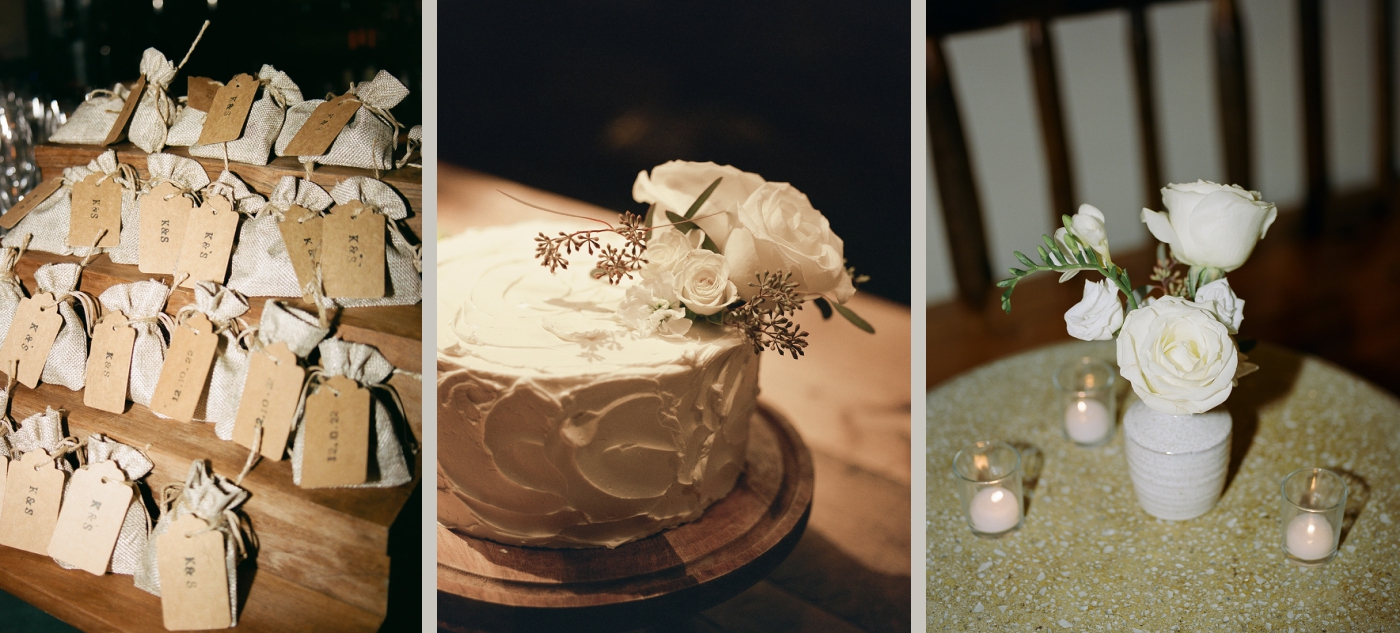 A wedding cake decorated with a single white rose