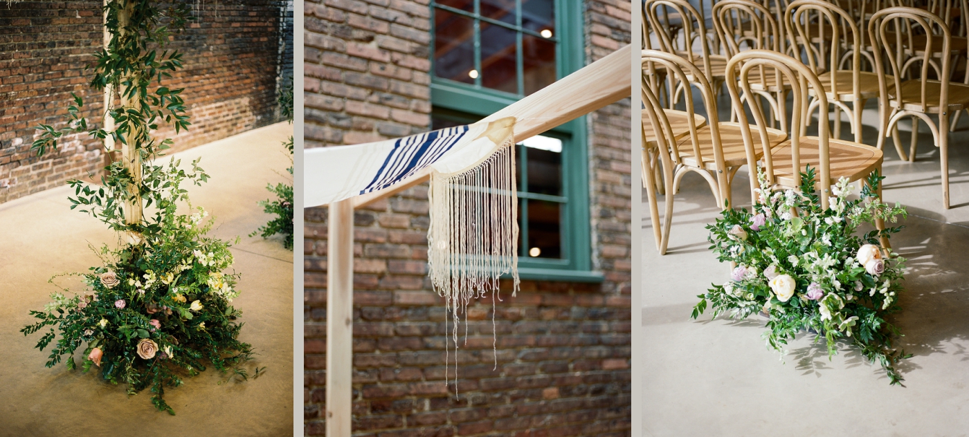 Details of a minimalistic chuppah with a prayer shawl and flowers