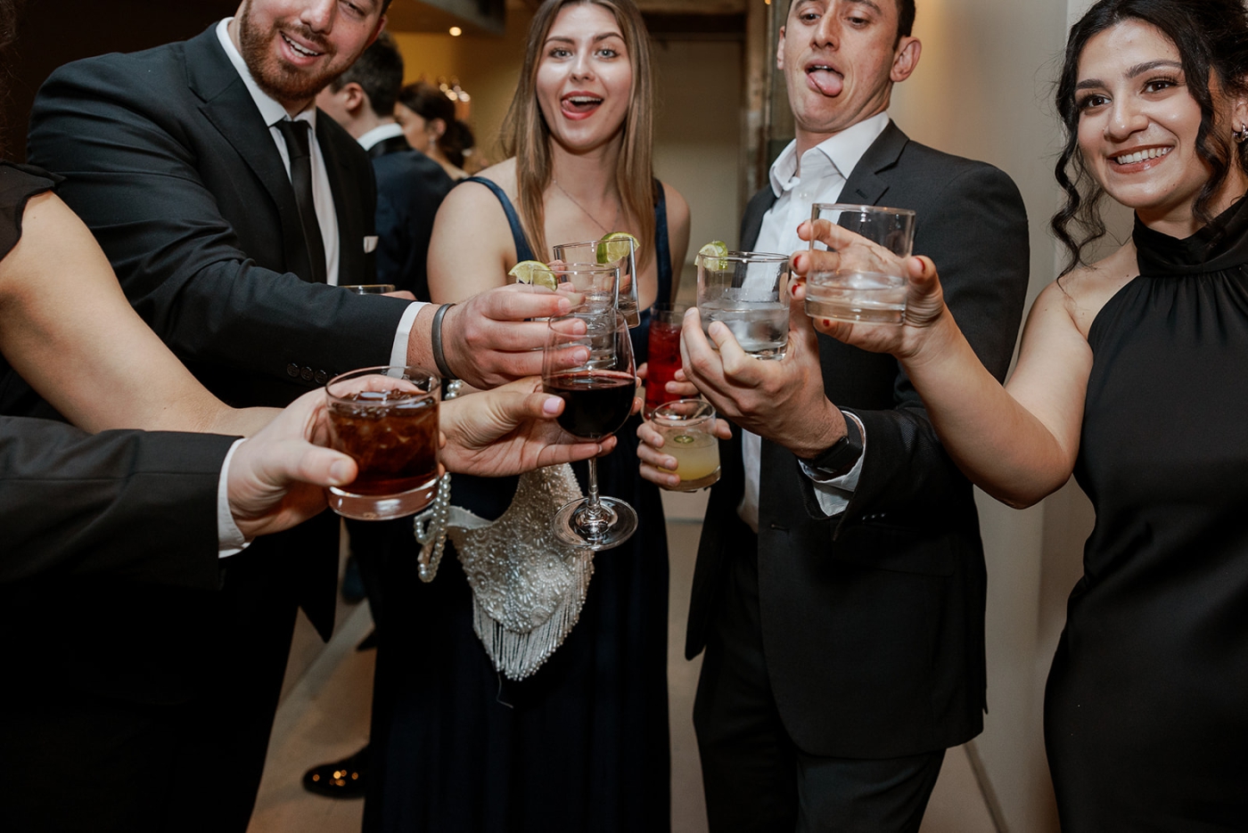 Guest toast to the new couple during cocktail hour at the Winslow Baltimore