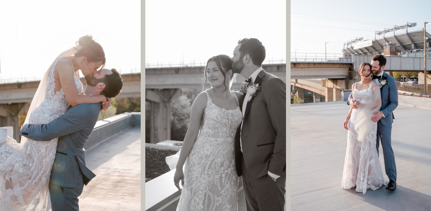 A groom lifts a bride off the ground and kisss her